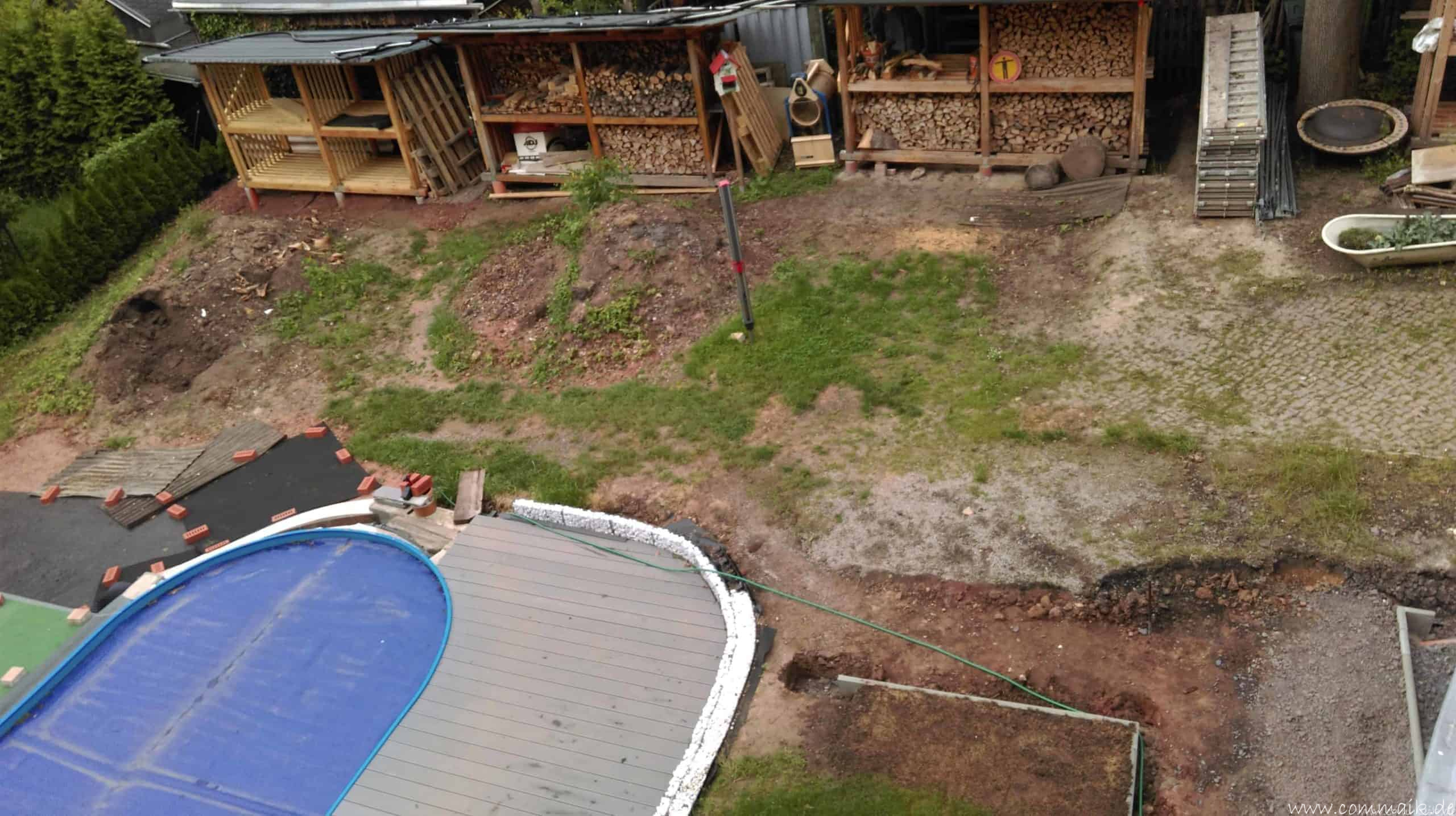 Pool Aussenanlagen vorbereiten Platz schaffen für die Rasenanlage